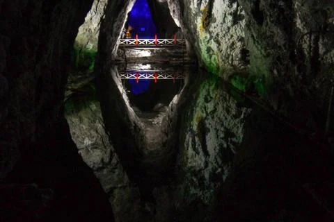 Mirror effect with beautiful reflection on the water near underground salt mine Stock Photos
