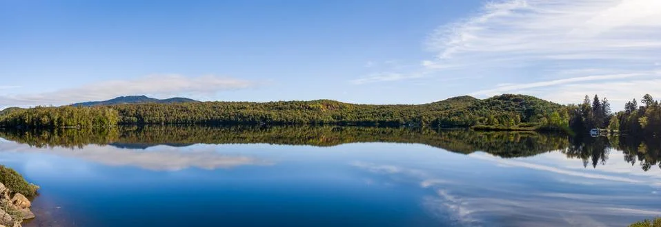 Mirror effect lake during fall in Mount Tremblant, Quebec, Canada Stock Photos