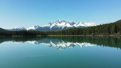 Mirror Lake with mountain reflection, drone shot Stock Footage 289576829
