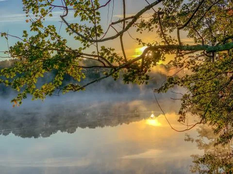 Mirror Lake reflection in fall with trees and clouds Stock Photos