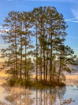 Mirror Lake reflection in fall with trees and clouds Stock Photos
