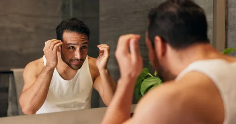 Mirror, man and beard care with wink in bathroom for beauty, grooming or check Stock Footage 337037743