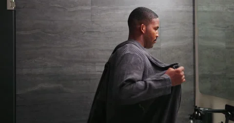 Mirror, man and remove robe in bathroom for grooming, morning routine and Stock Footage 337503635