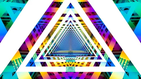 Mirror panels of a color triangular tunnel reflect each other and create the Stock Footage 130507565