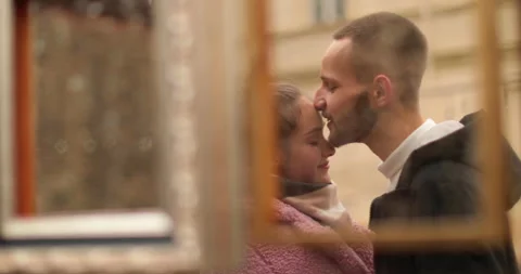 Mirror reflection of a couple in love, tenderly embracing while standing Stock Footage 247185236