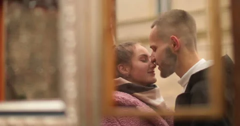 Mirror reflection of a couple in love, tenderly embracing while standing Stock Footage 247185345