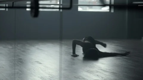 Mirror reflection in dance studio of modern contemporary dancer stretching 스톡 동영상 104269307