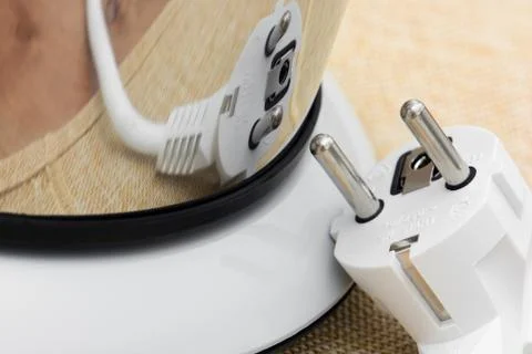 Mirror reflection of electrical plug Stock Photos
