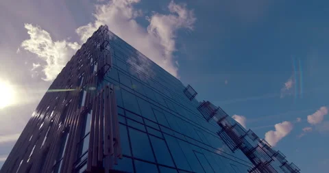 Mirror reflection in the glass surface of a skyscraper blue sky with clouds Stock Footage 119616900
