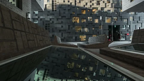 Mirror Reflection On The Ground Of Glass And Granite Building - DNB In Stock Footage 143824394
