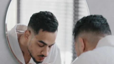 Mirror reflection portrait arabian arab indian bearded man washing face male wet Stock Footage 170402372