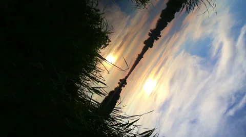 Mirror reflection of the setting sun in the water. Evening landscape. Stock-Footage 40744070