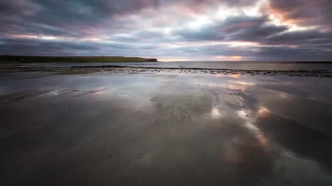Mirror Reflections on the Bay of Skaill Below Skara Brae in Sandwick Orkney 動画素材 253322537