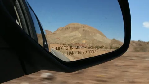 Mirror Reflections While Driving Through the Nevada Desert Stock Video Stock Footage