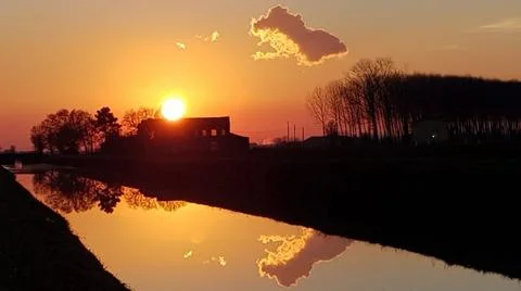 Mirror river sunset Stock Photos