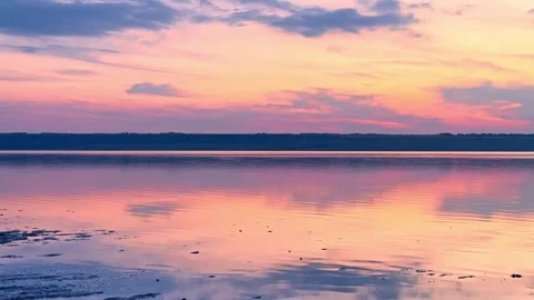 Mirror-Like Shallow Salt Lake at Pink Twilight Stock-Footage 344818872