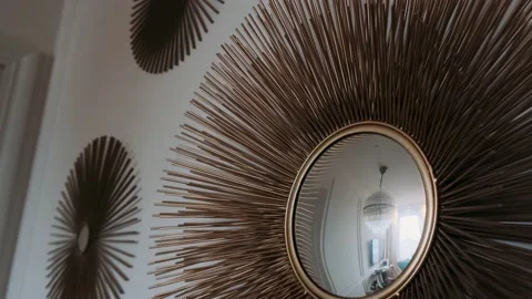 Mirror in the shape of the sun Stock Footage 233885389