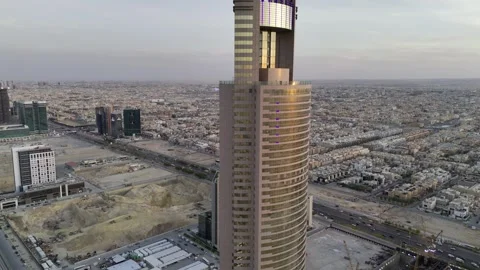 Mirror skyscraper with open aria in the middle Saudi Arabia Riyadh Stockbeeldmateriaal 285328015