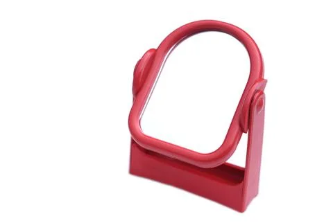 Mirror with stand, red frame Stock Photos