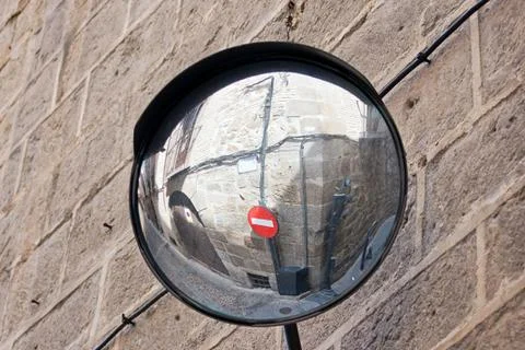 Mirror with street reflected Stock Photos