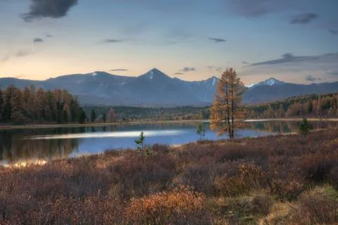 Mirror Surface Lake Autumn Landscape With Mountain Range On Background With Stock Photos