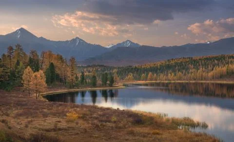 Mirror Surface Lake Beautiful Evening Autumn Landscape With Mountain Range On Stock Photos
