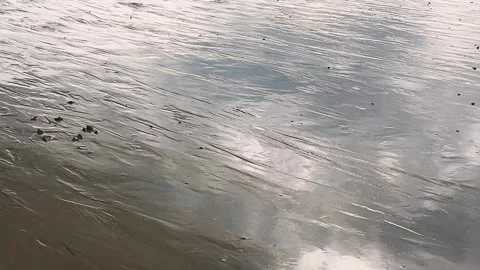 Mirror-like surface of the Plage de l’Eventail sandy beach. Stock Footage 311954887