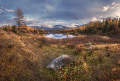 Mirror Surface Wide Angle Lake Autumn Landscape With Mountain Range On Stock Photos