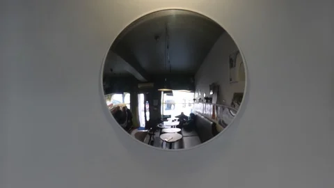 Mirror view of blurred cafe interior 库存影片 96727527