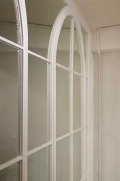 Mirror wall reflecting interior design scene Stock Photos
