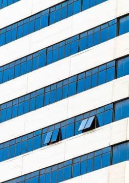 Mirror windows on builing wall. Stock Photos