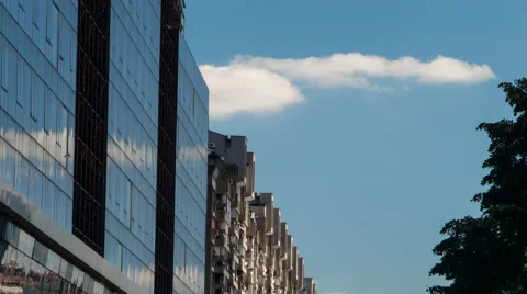 Mirrored and concrete building. Clouds. Stock Footage