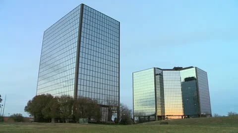 Mirrored buildings at sunset timelapse Stock Footage 12505348