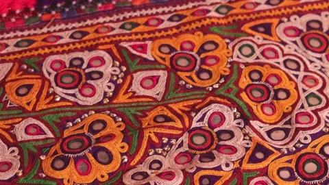 Mirrored embroidery work typical of the Aahir tribe,unidentified man embroide Stock Footage 147478261