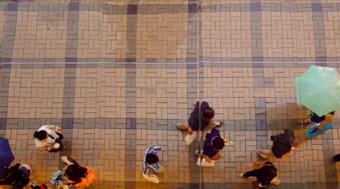 MIRRORED REFLECTION LOOKING DOWN PEDESTRIANS Stock Footage 67011415