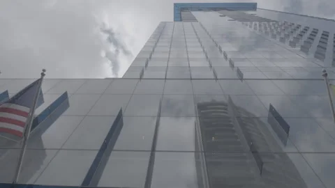 Mirrored Reflection in the Side of a Office Tower Stock-Footage 154004739