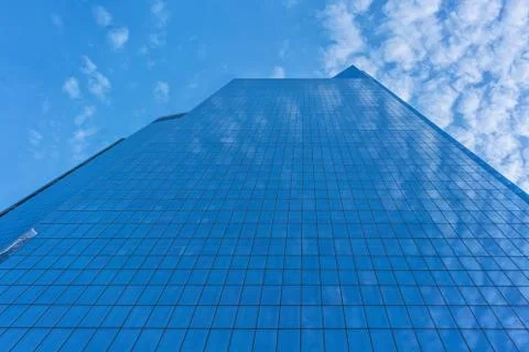 Mirrored skyscraper seen from below. Stock Photos