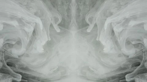 Mirrored smoke diffusing in close-up across gray symmetrical vapor Stock Footage 338270830