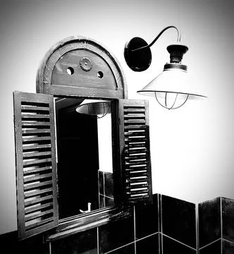 Mirrored window with lamp Foto stock