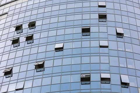 Mirrored windows on the facade Stock Photos