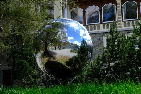 A mirroring sphere in a park Stock Photos