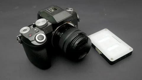 Mirrorless camera and small lighting Stock Photos