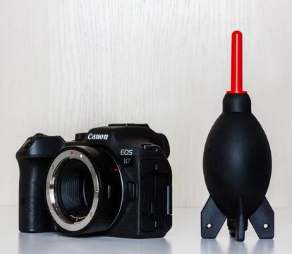 Mirrorless camera Canon eos r7 with adapter for lenses Stock Photos