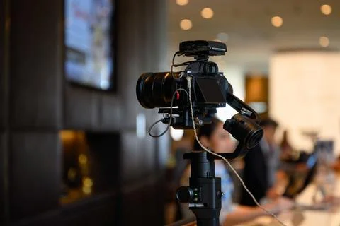 Mirrorless camera with mic wireless on gimbal stabilizer Stock Photos