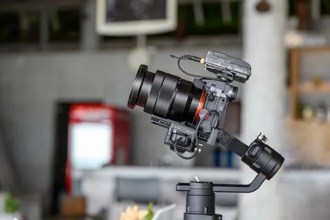 Mirrorless camera with mic wireless on gimbal stabilizer Stock Photos