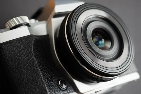 Mirrorless camera with an old style Stock Photos