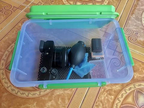 Mirrorless Camera Stored in a Dry Box for Protection Stock Photos