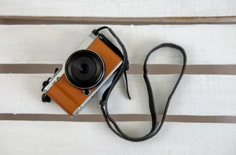 Mirrorless camera on white boards Stock Photos