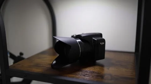 Mirrorless camera on wooden shelf Stock Footage 336927760