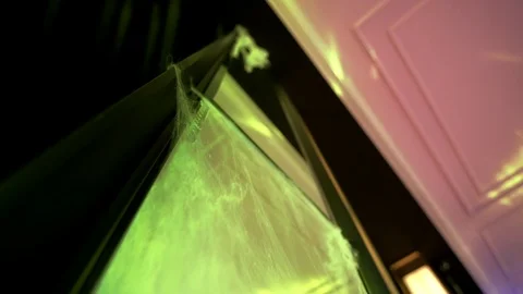 Mirrors covered with artificial spiders web at Halloween party in nightclub Stockbeeldmateriaal 116718640